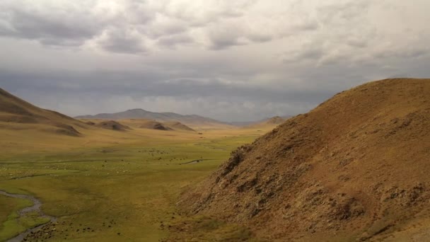 Aerial Dolly Mongolian Steppe Back Sun Light Yet Cloudy — Vídeos de Stock