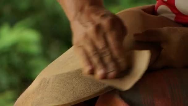 Hands Indigenous Woman Sanding Homemade Wooden Bowl — Stock Video