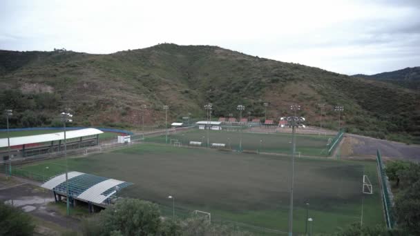 Far Away Soccer Field Mountains — Vídeo de Stock