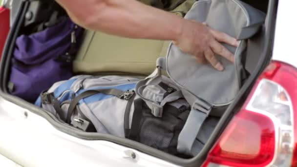 Close Shot Person Taking Bags Backpacks Putting Trunk Car — Vídeo de stock
