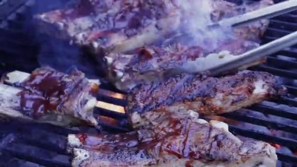 Bbq Ribs Grill Closeup Being Turned Close — Stockvideo