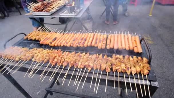 Man Grilling Multiple Types Meat Saucing — ストック動画
