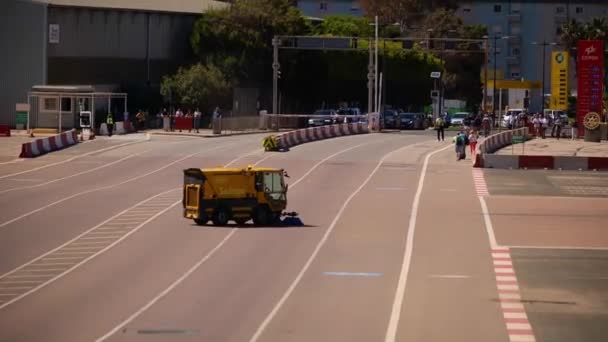 Yellow Road Cleaner Cruising Highway Wide Shot — Stockvideo