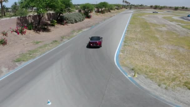 Drone Footage Car Driving Sunny Day Palm Spring Valley California — 비디오