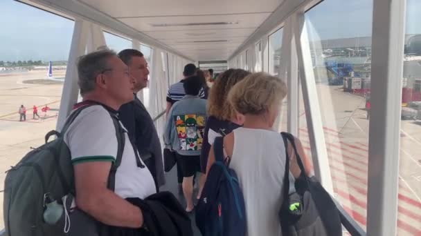 Passengers Hand Carry Boarding Plane Jet Bridge Airport Pov — Video Stock