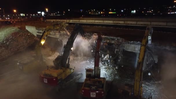 Heavy Machinery Diggers Clamps Demolishing Bridge Night Aerial Close View — ストック動画