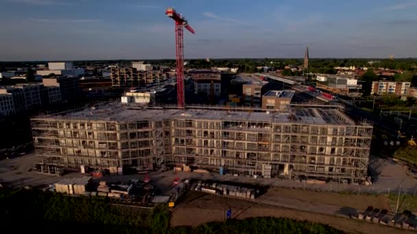 Backwards Aerial Movement Showing Construction Site Luxury Apartment Building River — Stockvideo