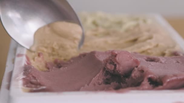 Eating Italian Ice Cream Tub Using Spoon — Video Stock