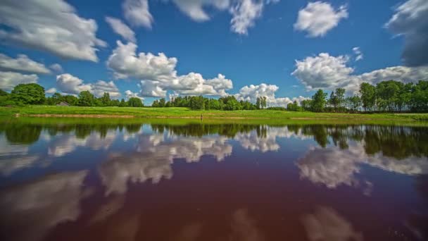 Sky Clouds Shoreline Reflect Glassy Mirror Surface Lake Wide Angle — Video