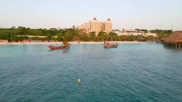 Nungwi Beach Zanzibar Tanzania Fishing Boats Tourists Indian Ocean Sunset — Stockvideo