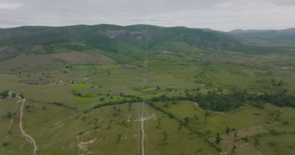 Aerial Flying Cables High Voltage Towers Tilt Shot Cables Road — Stock videók