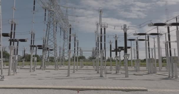 Aerial Dolly Right Voltage Power Lines Substation Sunny Day Low — Αρχείο Βίντεο