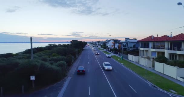 Drone Shotted Cinematic Footage Several Cars Travelling City Street Residences — Vídeos de Stock