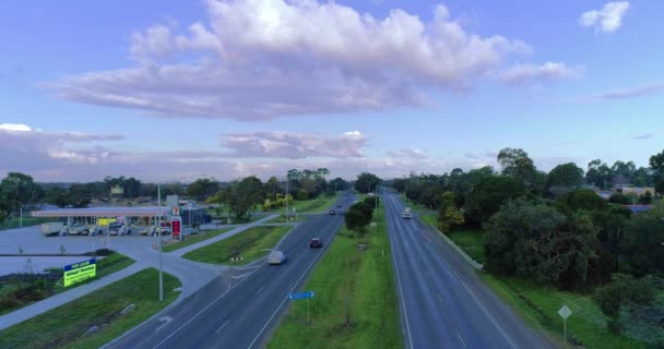 Drone Captured Aerial Video Multiple Cars Driving Highway Lush Green — Stock Video