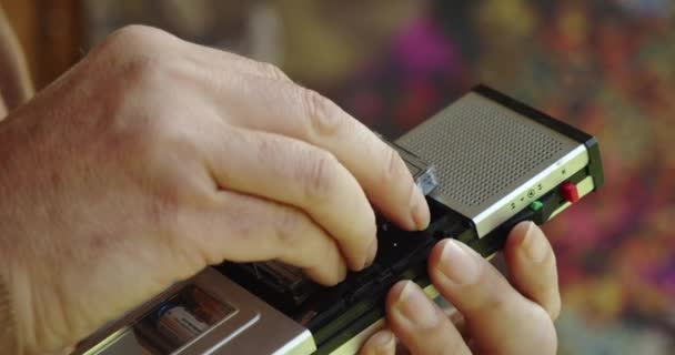 Man Hand Inserts Microcassette Retro Handheld Tape Recorder — Vídeos de Stock