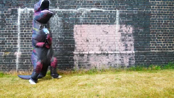 Happy Funny Prehistoric Dinosaur Spraying Bubbles Brick Wall — Videoclip de stoc