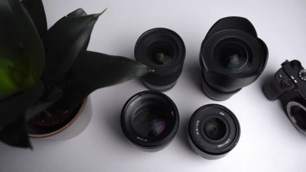 Sony Photography Lenses Top Laid White Table — Stockvideo