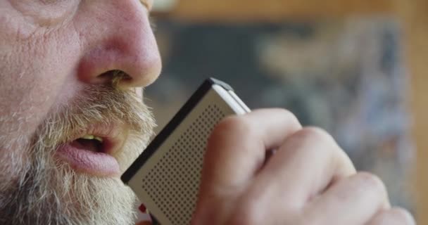 Bearded Man Dictates Notes Tape Recorder Close Shot — Wideo stockowe