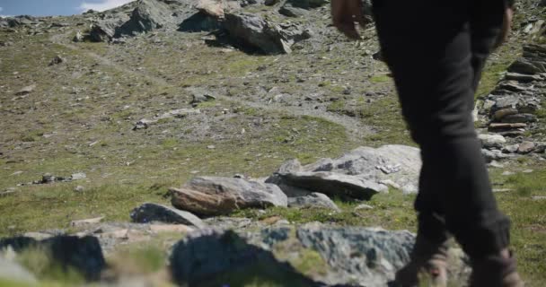 Black Male Traveler Backpack Walking Screen Explore Matterhorn Mountainside Switzerland — Stockvideo