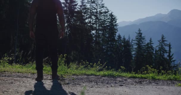 Black Male Traveler Walking Cliff Ridge Looking Out Masssive Mountain — Stockvideo