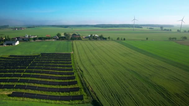 Aerial View Agricultural Green Fields Solar Farm Wind Turbines Background — Vídeo de Stock