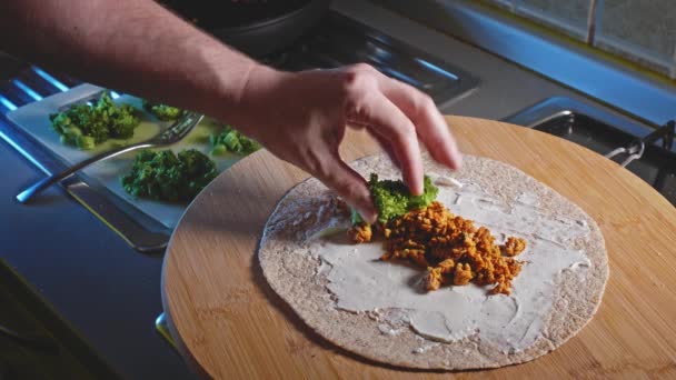 Placing Nutritious Broccoli Top Tortilla Wrap Low Fat Cheese Cooked — Stockvideo