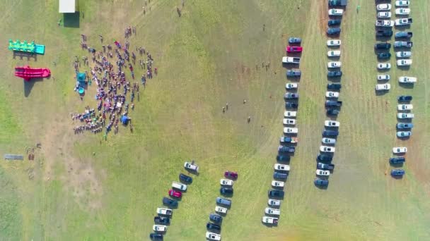 Top Shot Crowd Gathering Baptism Cars Parked Field — Stockvideo