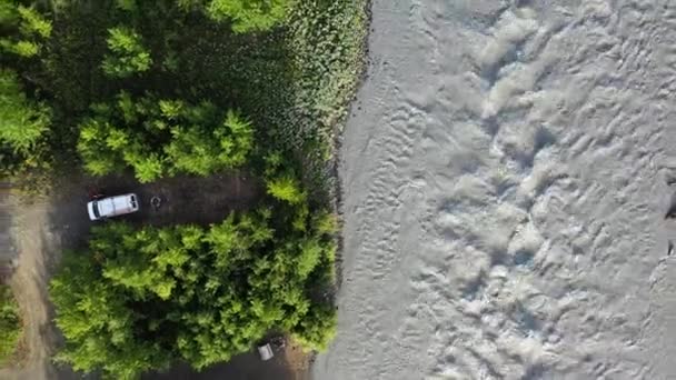 Couple Camping Forest Mountain River Aerial Directly Ascending Shot — Stockvideo