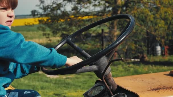 Boy Old Yellow Tractor Pretending Driving Turns Steering Wheel Playing — Stockvideo