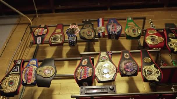 Panning View Championship Belts Trophies Kept Gym — Vídeos de Stock