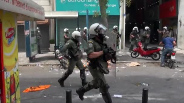 Greek Riot Police Carrying Shields Wear Helmets Gas Masks Charge — Vídeo de Stock