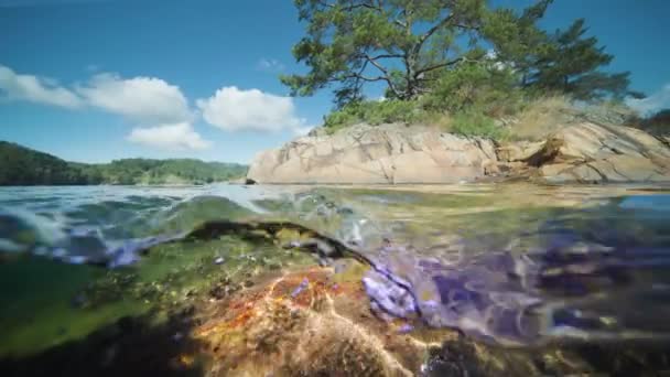 Fjord Water Split View Sun Rays Pierce Water — Stockvideo