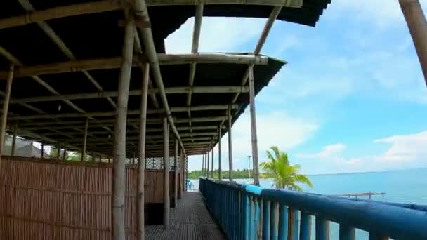 Fpv Drone Fly Bamboo Shack Walkway Ocean Side Old Restaurant — Stock Video