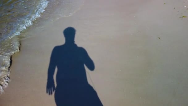 Pov Shadow Man Walking Waves Sandy Beach Sunlight — Video Stock