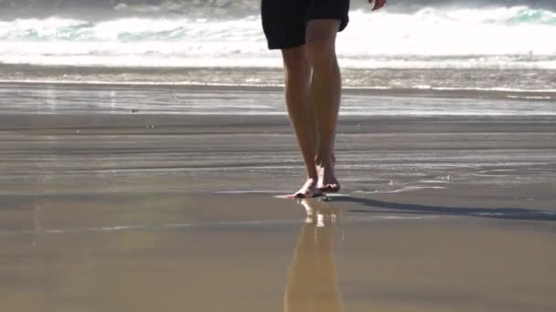 Man Walking Beach Slowmotion Showing Bare Feet Stepping Sand — Wideo stockowe