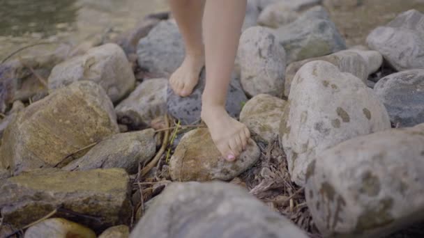 Foot View Attractive Girl Walking Rocky Beach — Stockvideo