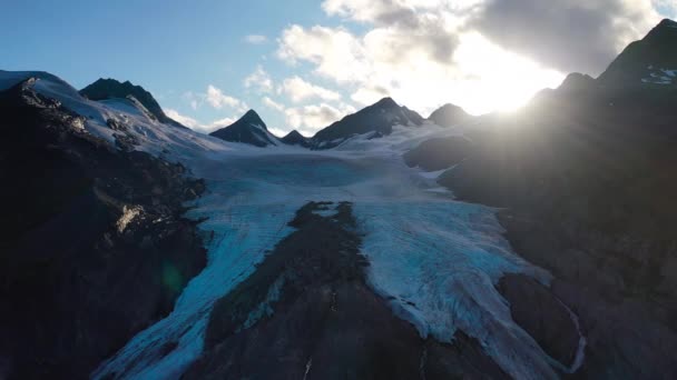Aerial Closeup Sliding Snow Capped Mountain Peak Shining Sun Summer — Video Stock