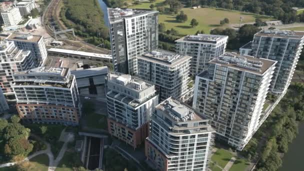 Residential Apartment Complexes Units Buildings Train Lines Background Orbiting Aerial — Wideo stockowe