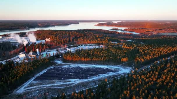 Industrial Chimneys Solar Field Sunlit Forest Nordic Winter Sunset Landscape — Video Stock