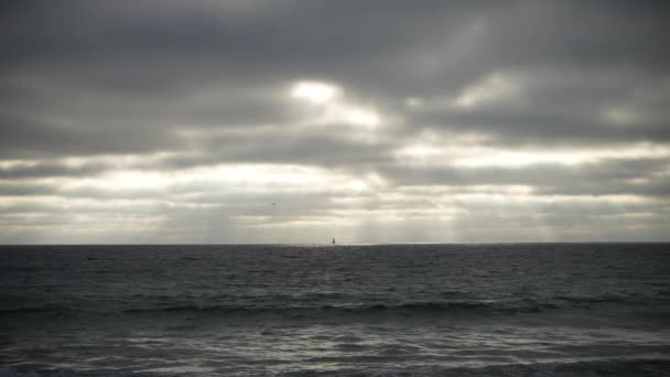 Sail Distant Sailboat Seen Horizon Ocean Gloomy Day Sun Rays — Stock videók