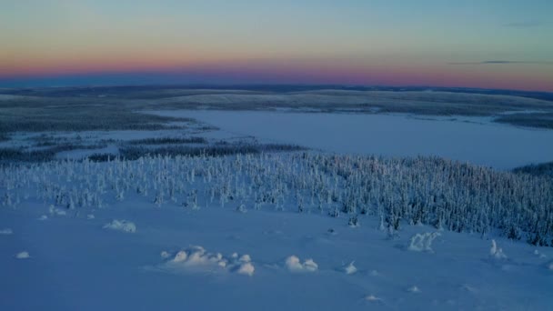 Aerial Reverse View Atmospheric Sunset Snowy Landscape Reveal Remote Cabin — Stockvideo