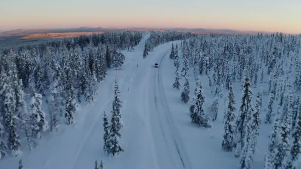 Aerial View Snowy Scandinavia Landscape Vehicle Journey Long Curved Remote — Stockvideo