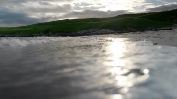 Low Angle Shot Waves Gently Crash Sandy Beach Very Close — Vídeo de Stock