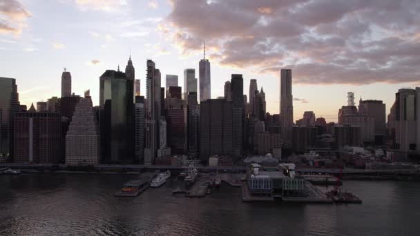 Aerial View Front Backlit Lower Manhattan Cityscape East River Sunset — Stockvideo