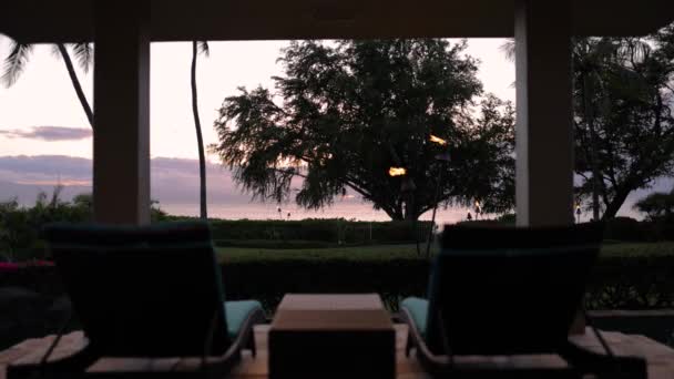 Luxury Pool Chairs Facing Hawaiian Sunset Tiki Torches — Video