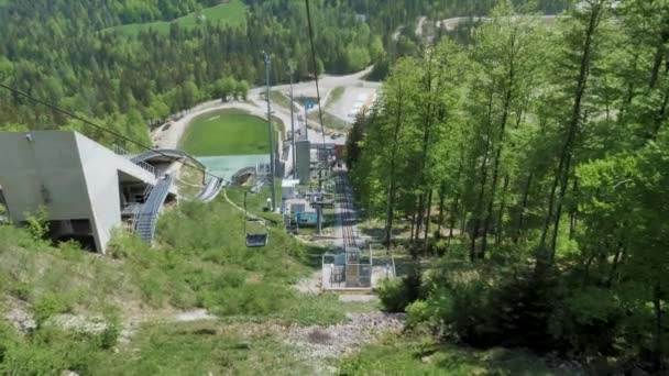 Riding Chair Lift Hill Planica Slovenia Summertime Trees Ski Jumps — Vídeo de stock