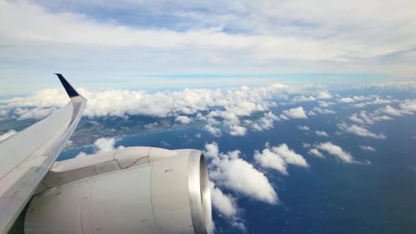 Aircraft Wing Engine Viewed Window Flying Airplane Ocean Island Land — Video
