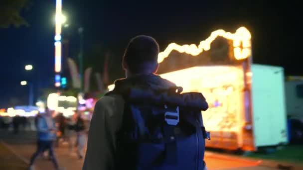 Short Haired Man Backpack Walking Funfairs — Video Stock