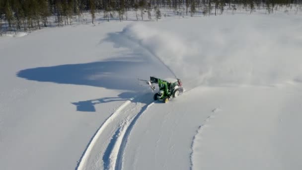 Aerial View Tractor Digger Blowing Snow Creating Trail Road Rural — Vídeos de Stock