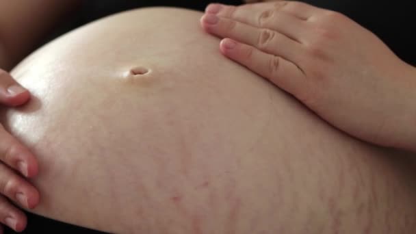 Close Pregnant Woman Lying Rubbing Her Belly Third Trimester — Stok video